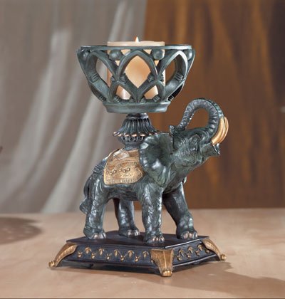 Elephant With Upraised Trunk Candle Holder.