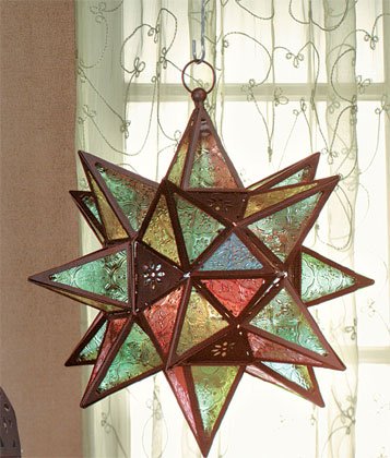 Star-Shaped Candle Lantern Reminiscent of Moroccan Designs.