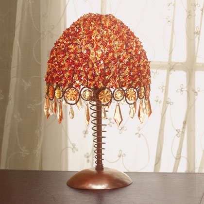 Metal Lamp With Orange and Red Beaded Lamp Shade.