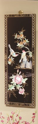 Inlaid shell birds and leaves on a lacquered wood screen