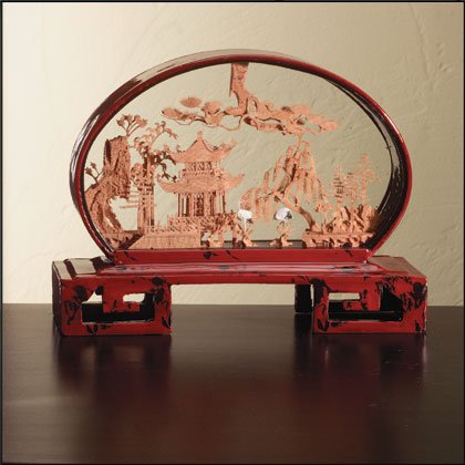 Carved cork scene in marbled red lacquer frame