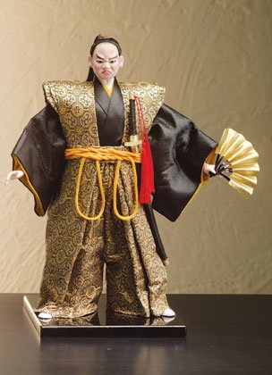 Samurai figure with fan and sword