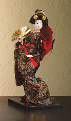 Porcelain geisha with fan.