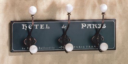 Hotel de Paris coat hanger with three ball-topped hooks