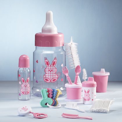Pink 10-piece baby gift set in a bottle savings bank.