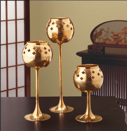 Candle holders with star cut-outs