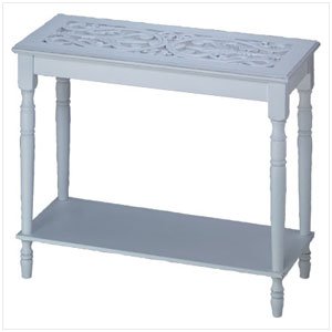 INTRICATELY CARVED-TOP TABLE