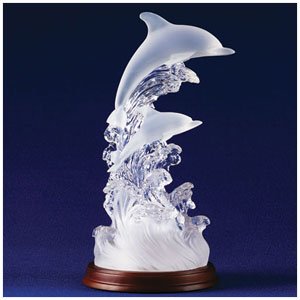 DOLPHINS ON WAVES OF LIGHT