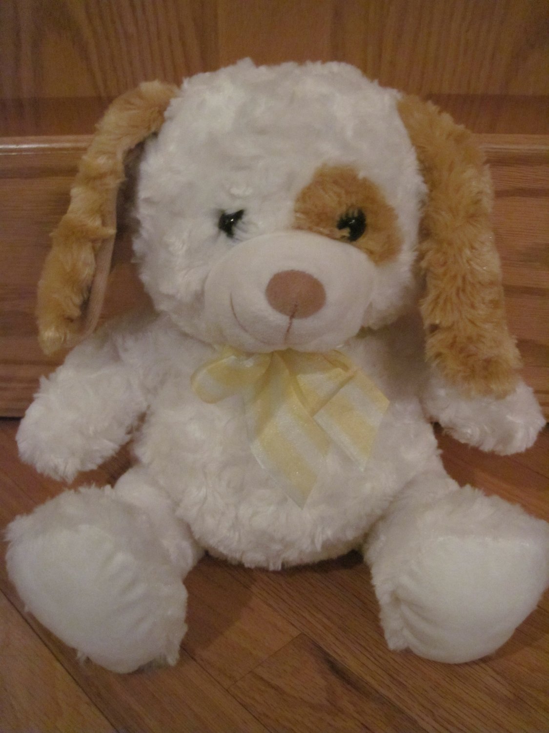 brown and white stuffed animal dog