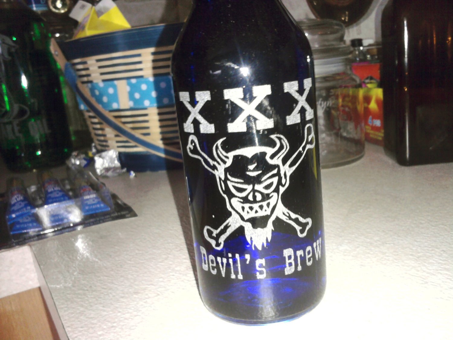 XXX Devil's Brew Hot Sauce Bottle