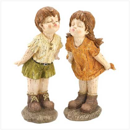 Our First Kiss Statues