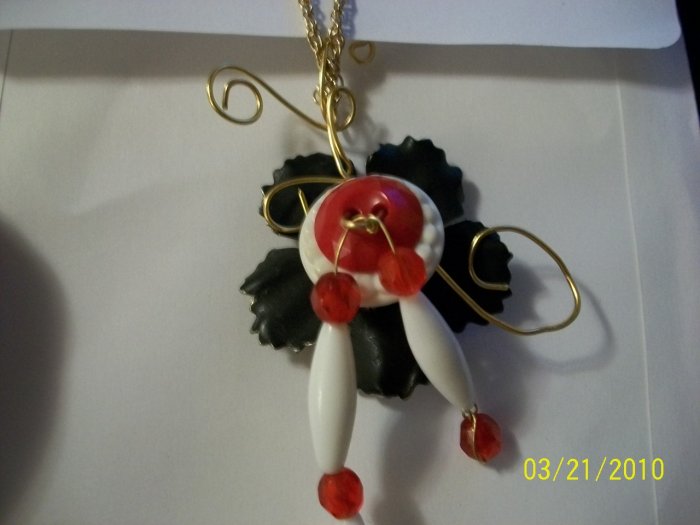 Spring button pendant