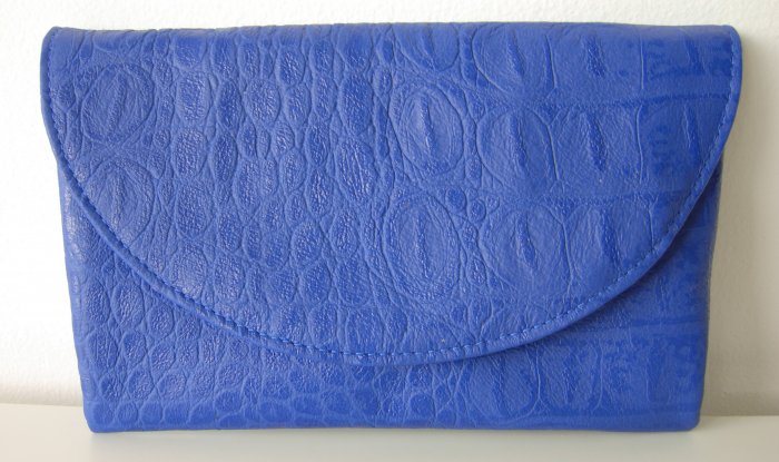 blue embossed leather clutch
