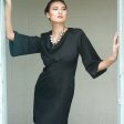 black cowl neck dress with bell sleeves