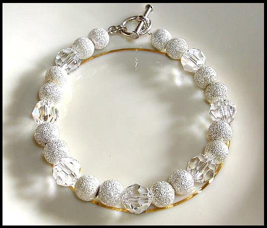 Classy Swarovski Clear Round and Sterling Silver Bracelet