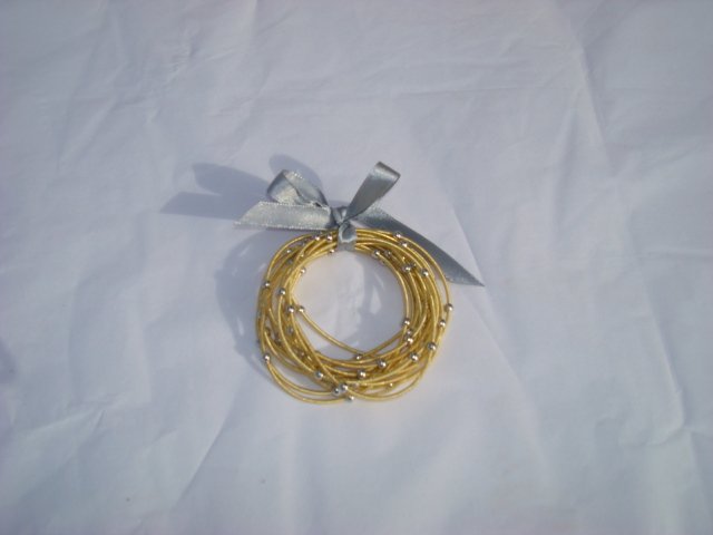 Gold Bracelets with Silver Balls