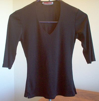 black 34th Street ribbed shirt like new size medium 3/4 sleeve good condition