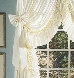 RUFFLED ELEGANCE CURTAIN BOWS