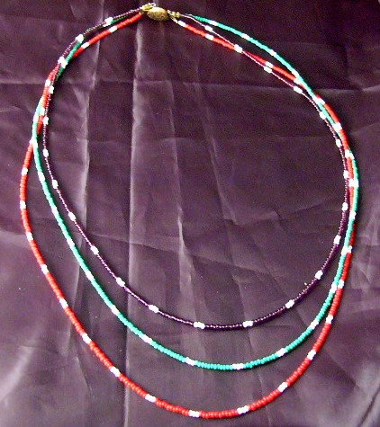 Hip on this 3 layer multicolor vintage Love bead necklace