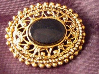 Oval Black Goldtone ornate Pin Vintage
