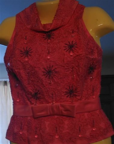 Nice Pink Top Or Vest For a women.