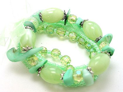 LIGHT OLIVE GREEN MULTI STRAND LUCITE BEAD BALL BRACELET