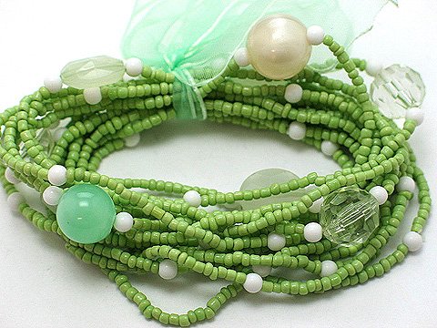 LIGHT OLIVE GREEN MULTI STRAND LUCITE BEAD BALL RIBBON BRACELET