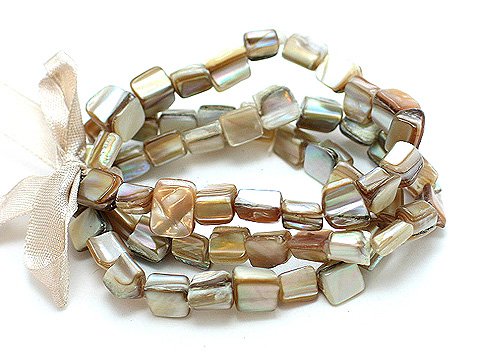 NATURAL MULTI STRAND SHELL BEAD RIBBON BRACELET