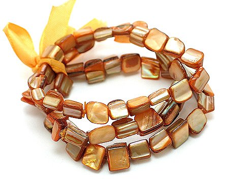 PEACH MULTI STRAND SHELL BEAD RIBBON BRACELET