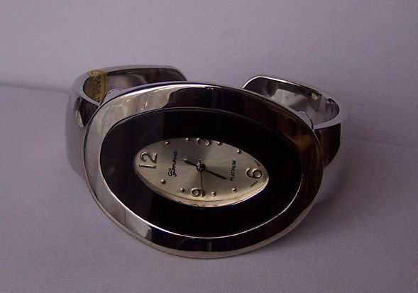 Black Oval Silver Tone Bangle Bracelet Watch