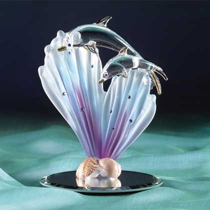 Dolphins with Shell