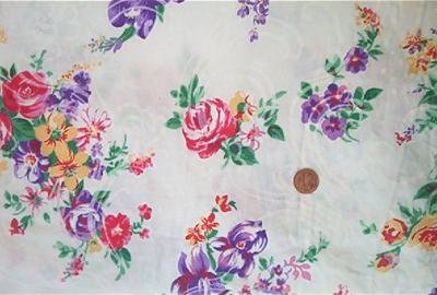 Pink and Purple Roses on White Fabric