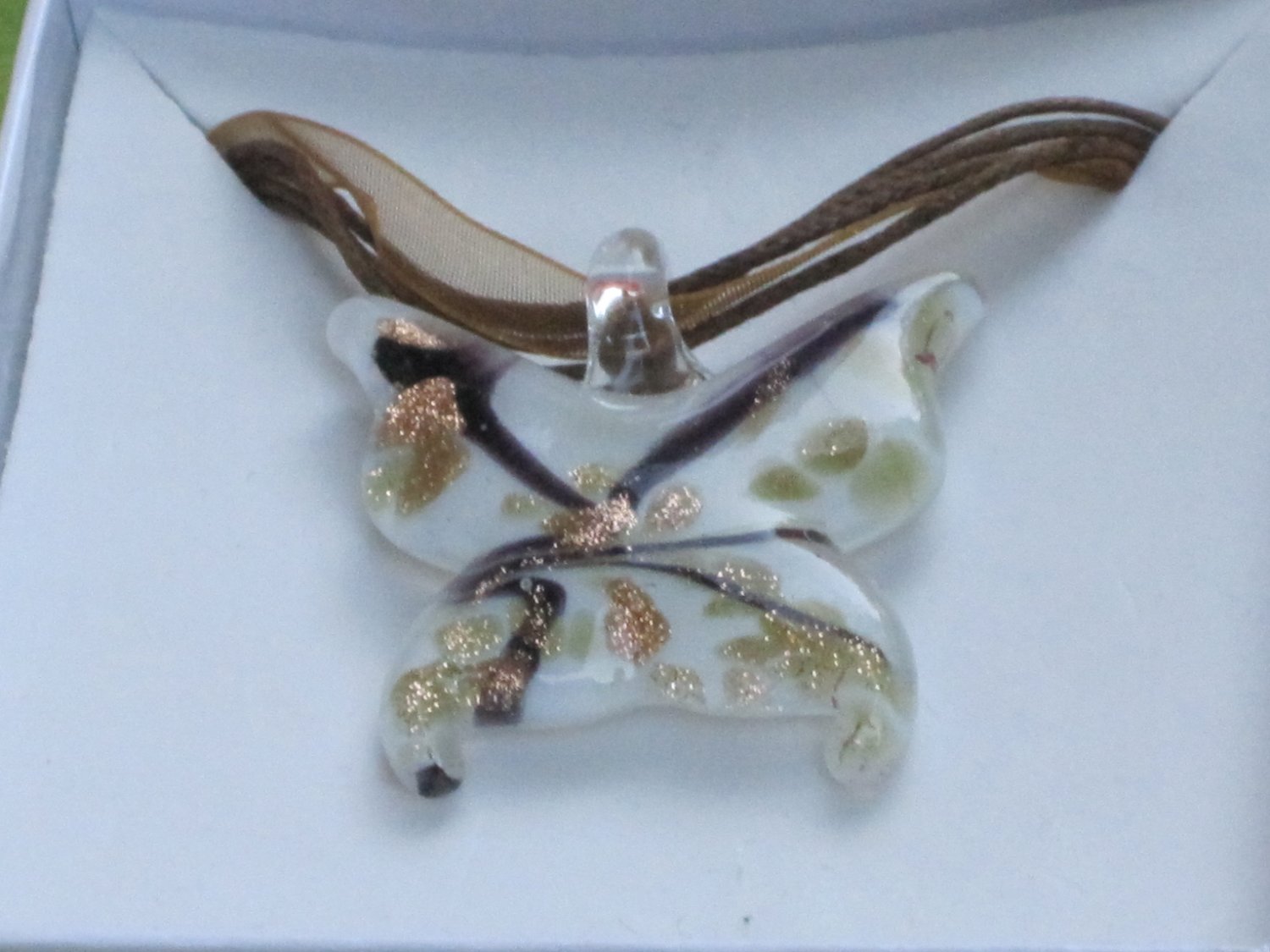 white butterfly glass necklace with gold speckles