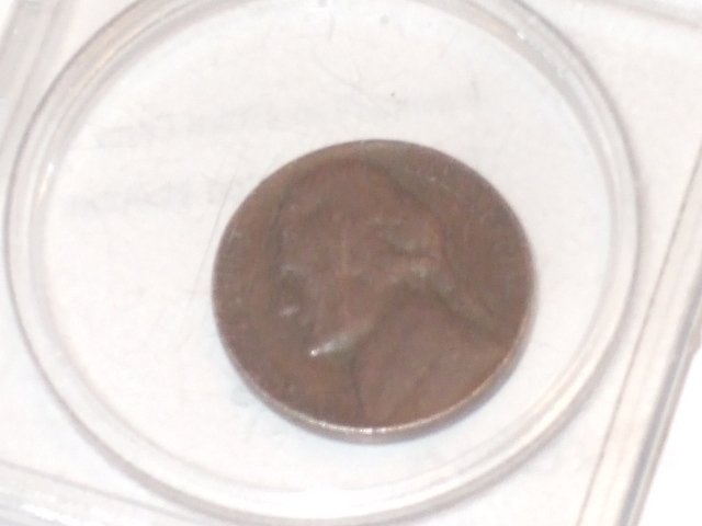 1957 NICKEL ERROR STRUCK ON ONE CENT PLANCHET