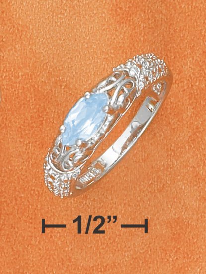 MARQUIS CUT BLUE TOPAZ ON ILLUSION CUT BAND W/ DIAMOND ACCENT