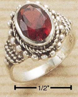 STERLING SILVER FACETED OVAL BEZEL SET GARNET (10MM X 7MM OVAL) RING