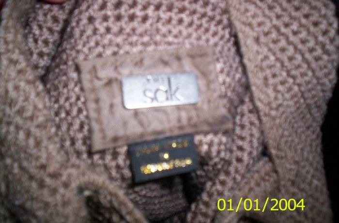 The Sak Beige Woven style purse Gently Used