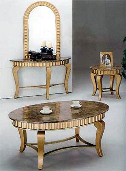 Marble top coffee table in gold finish. Other pieces sold separa