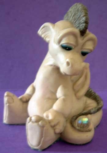 Krystonia Dragon with Crystal Wrapped in Tail