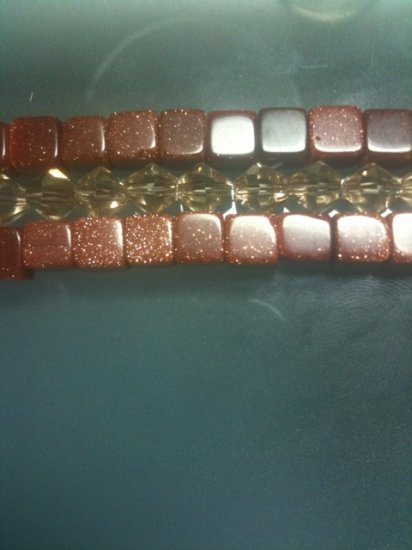 Goldstone and Crystal