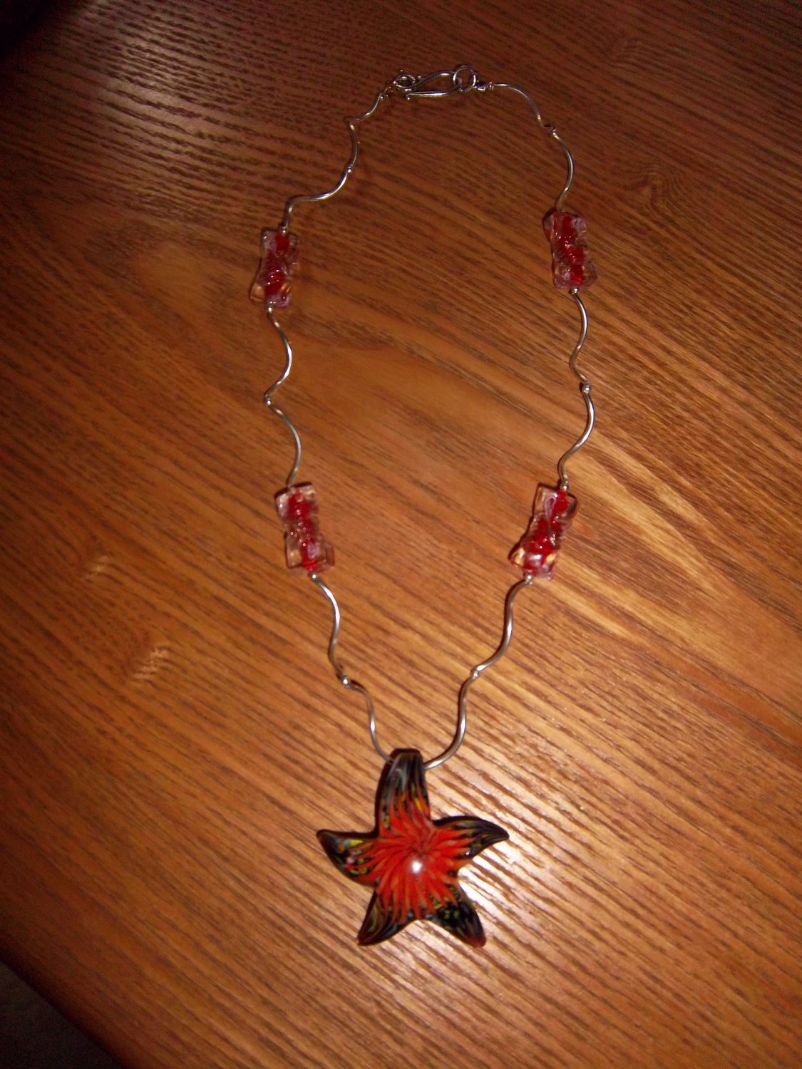 red necklace with pendant