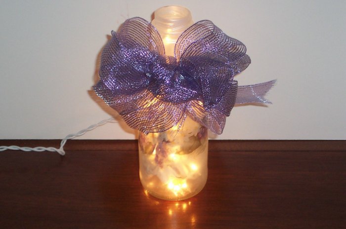 Lighted Glass Bottle Decorated with Flowers