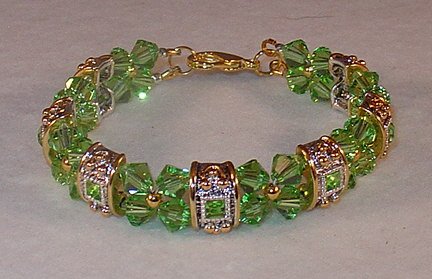 SWAROVSKI PERIDOT GOLD/SILVER BRACELET
