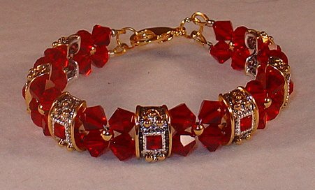 SWAROVSKI SIAM GOLD/SILVER BRACELET