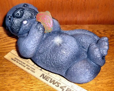 Otter on Back Candle, Candles