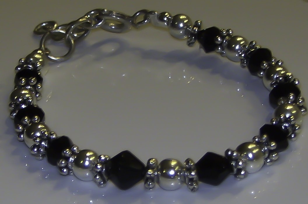 0-6 Months: Black and Silver Bracelet