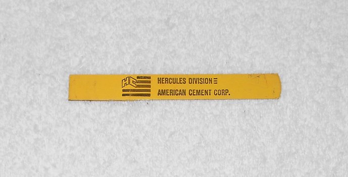 American Cement - Hercules Division - 4" Metal Clip - Yellow - Vintage