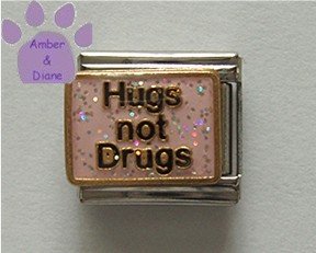 Hugs not Drugs Italian Charm on a pink glitter enamel background