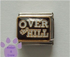 OVER THE HILL Italian Charm on a black enamel background