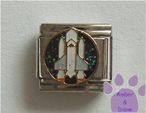 Space Shuttle Italian Charm on a black glitter disc